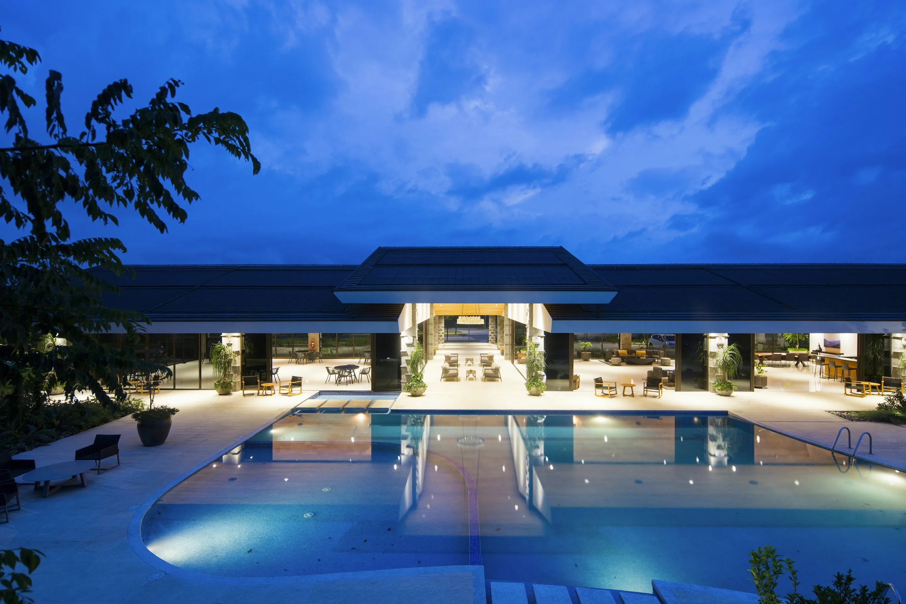 A pool lit up at night